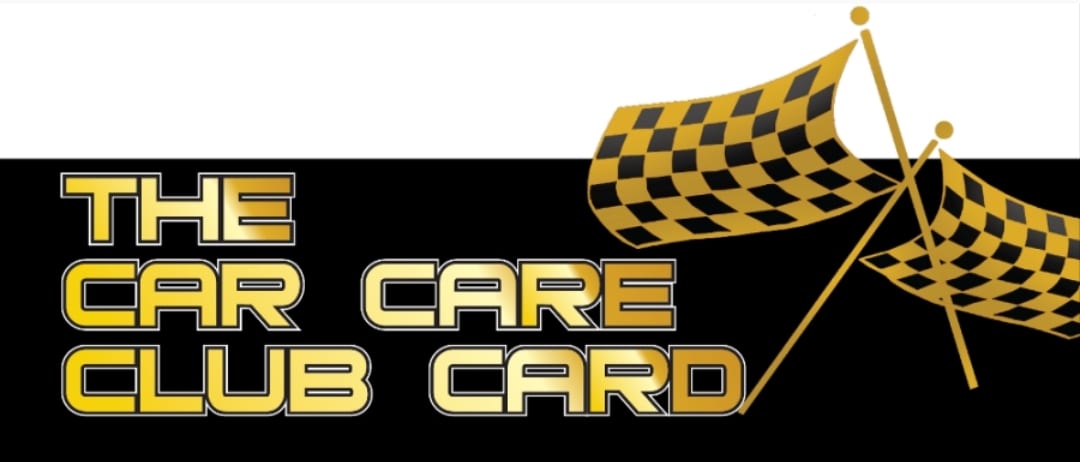 A black and yellow checkered flag with the words care club card in front.